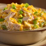 Close-up of a corn chicken casserole with creamy sauce and herbs