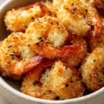 Close-up of shrimp cooked in a ninja air fryer with a clean, bright background.